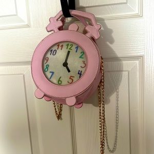 Pink clock shaped mini backpack